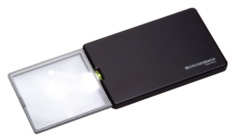 A thin black pocket magnifier. The lens is extended and ready to be used.