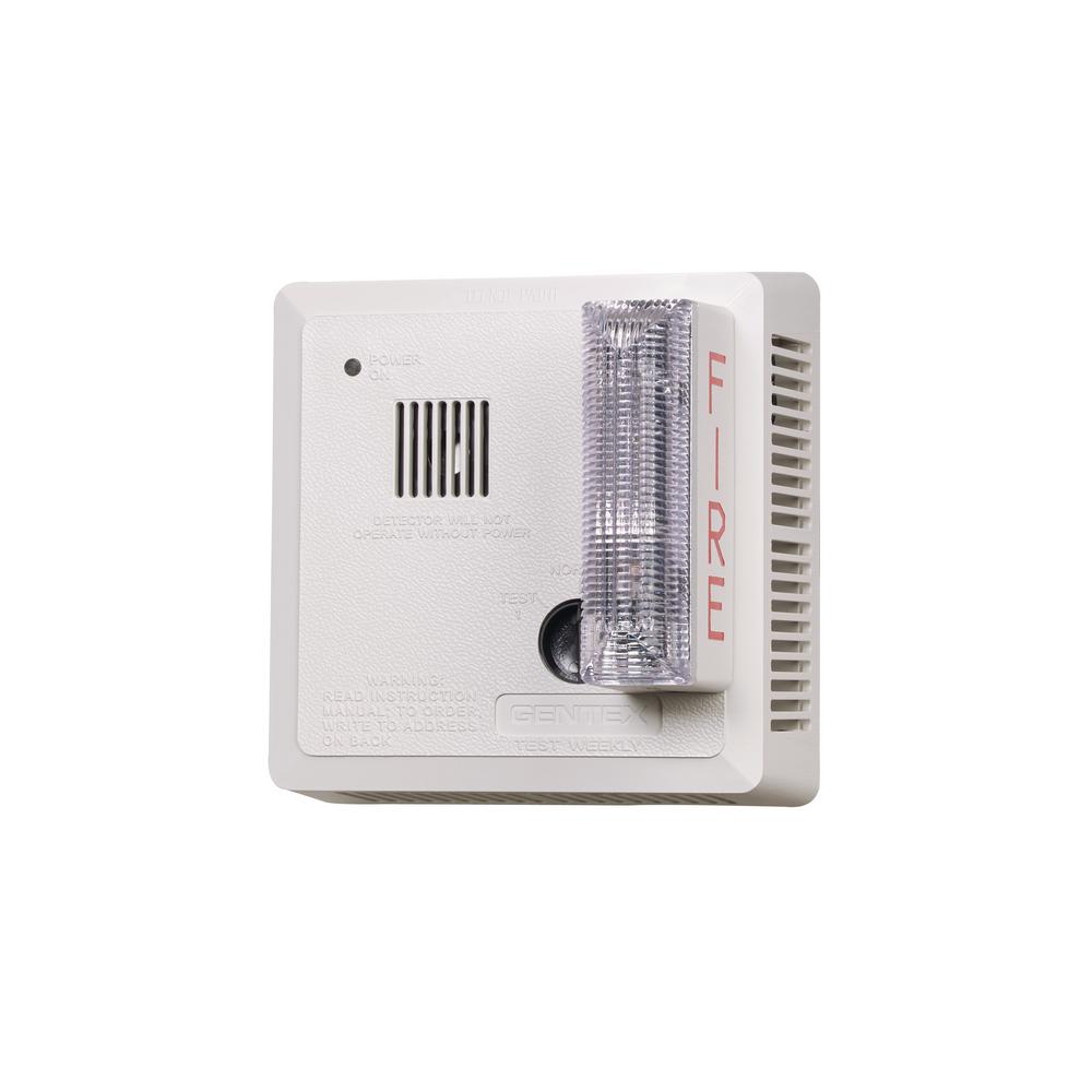White smoke detector with strobe light and speakers for loud noises