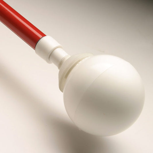 White ball on the tip of a cane