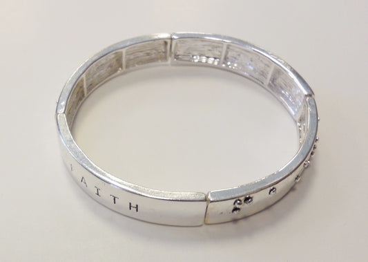 silver bracelet with the word faith in text and braillle