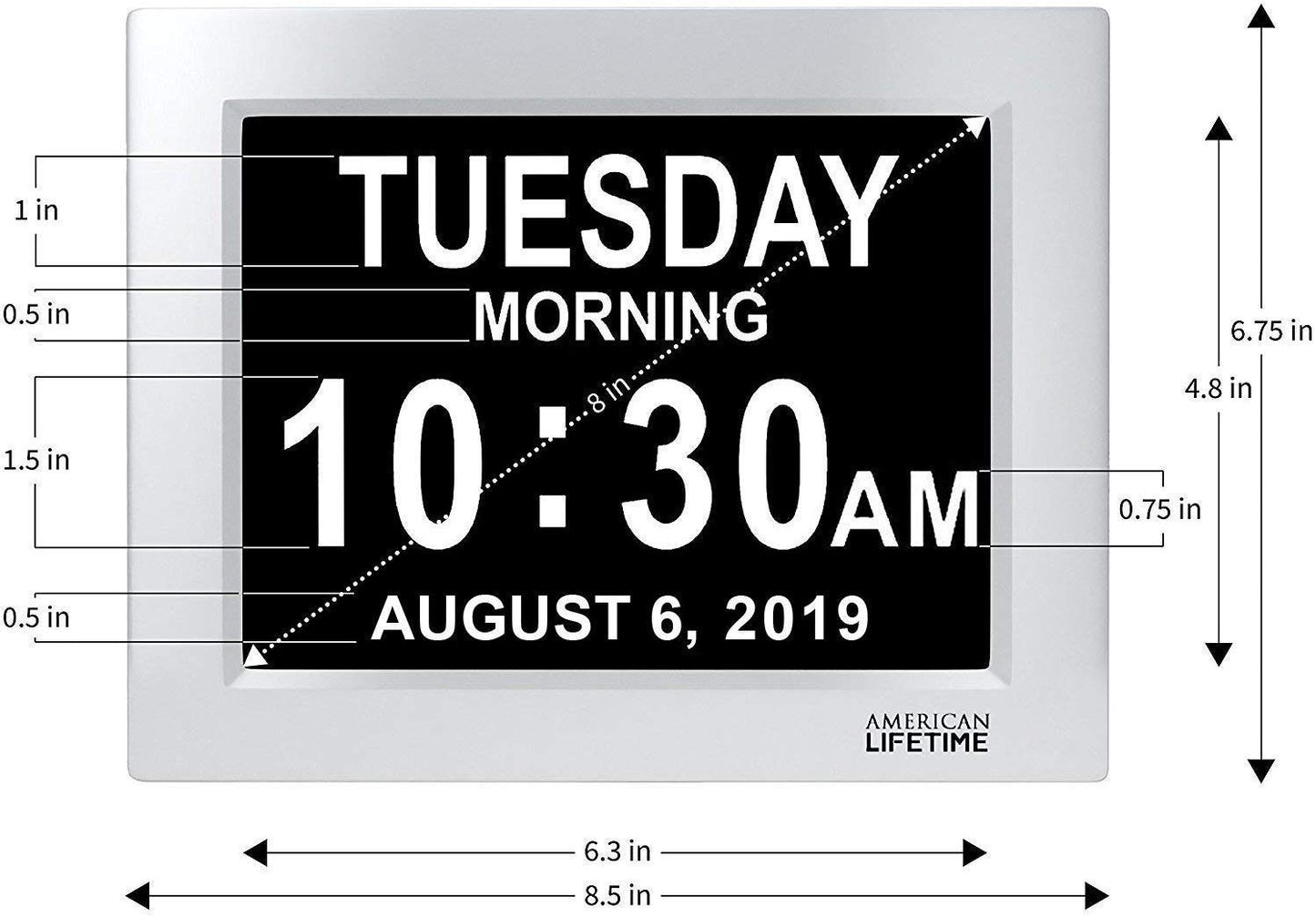 Silver and black clock displaying the date, time and day