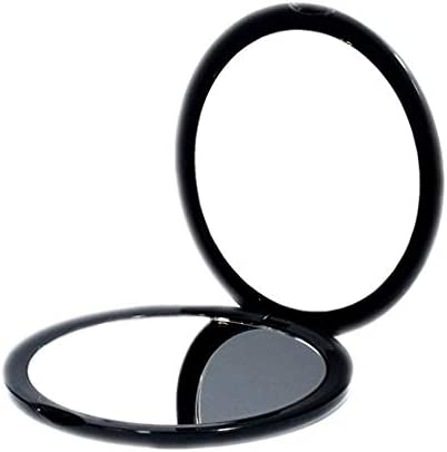 A black rimmed compact mirror that is open