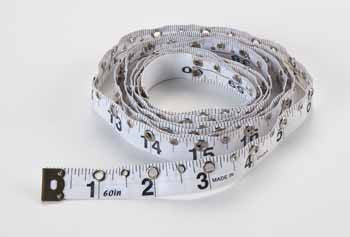 A measuring tape that has little metal encased holes indicating half and full measurements